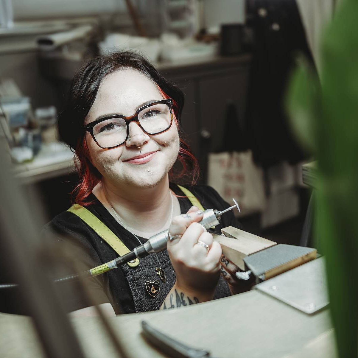 Smiling photo of Gi at her jewellery bench